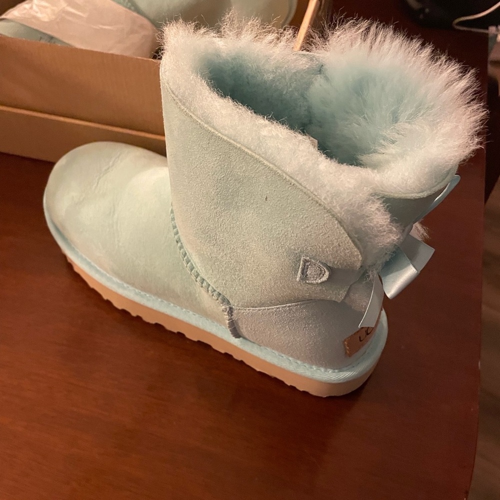 New mint color Ugg boots. New with box and tags.